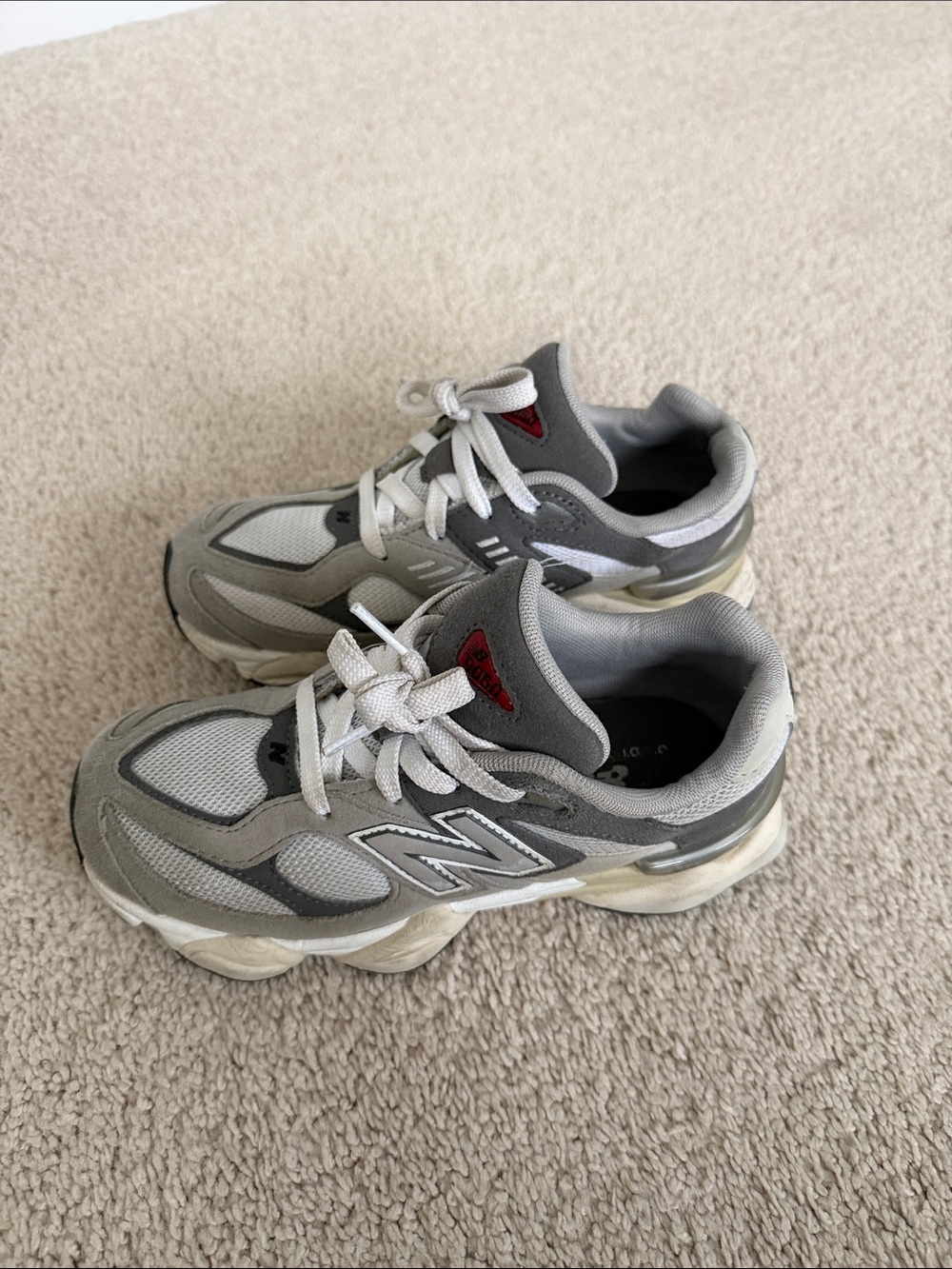 New Balance Kids Gray and White Sneakers with Red Accent